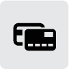 A black and white icon of two credit cards.